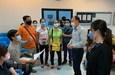  新冠肺炎疫情：帮助在泰国、新加坡滞留的越南公民回国