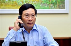 越南政府副总理兼外长范平明与加拿大外长进行电话会谈
