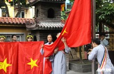越南在各宗教场所发起悬挂国旗的运动