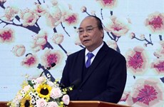 政府总理阮春福向越南企业界及企业家致春节慰问信