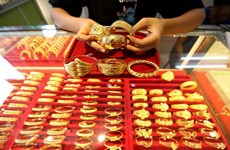 9日上午越南国内市场黄金价格每两上涨18万越盾 