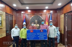 老挝各省捐款助力越南抗击新冠肺炎疫情 