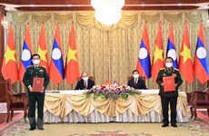 越南国防部与老挝国防部加强合作