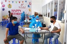 胡志明市开始为加工出口区的工人接种第二剂新冠疫苗