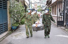 胡志明市和南方各省9月30日之后放宽社交距离措施  军队仍将继续助力做好疫情防控工作