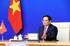越南政府总理范明政就加强亚欧各国合作提出四项建议