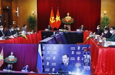 越南共产党代表团出席国际政党多边视频会议