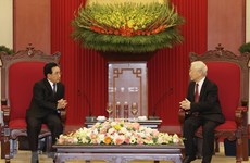 越共中央总书记阮富仲会见老挝政府总理潘坎·维帕万