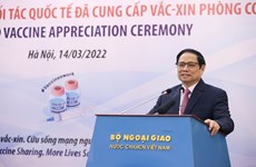 越南政府总理范明政：越南呼吁国际团结 坚持多边主义 共同抗击疫情