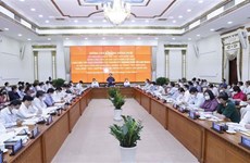 越南国会主席同胡志明市市委常委举行工作会议