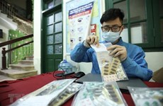 3月24日越南新增新冠肺炎确诊病例12万例 比昨日下降7886例