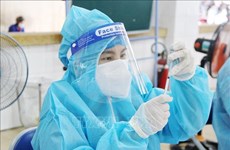 21日越南新增新冠肺炎确诊病例约1.2万