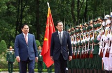 越南政府总理范明政为日本首相岸田文雄举行欢迎仪式