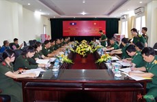 清化省军事指挥部与老挝华潘省军事指挥部签署合作协议