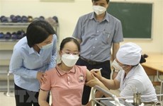 越南全国新增确诊病例881例 超9千例治愈病例