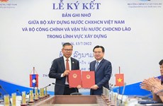 越南建设部与老挝公共工程和运输部签署合作备忘录