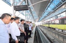 越南政府总理范明政视察河内城铁项目呠-河内火车站路段施工现场