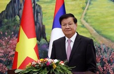 越老建交60周年：老挝人民革命党中央总书记、国家主席通伦呼吁两国人民继续保护和培育老越特殊关系
