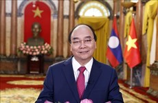 越老建交60周年：老挝媒体纷纷报道两国领导人发表的讲话