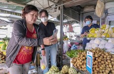 芹苴市推出首个非现金支付农贸市场