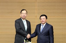 越南共产党代表团与日本政府机构和各政党领导人举行会晤