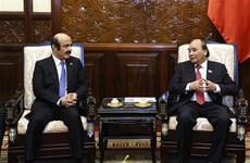  越南国家主席会见前来拜别的卡塔尔驻越南大使
