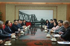 政府副总理武德儋会见老挝劳工与社会福利部部长白罕·卡提雅
