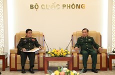 黄春战上将会见老挝国防部外事局代表和专员代表团