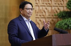 越南政府总理范明政：坚定不移保持宏观经济稳定  积极促进经济增长目标