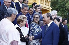 越南国家主席阮春福会见出席《巴黎协定》签署50周年纪念活动的国际代表