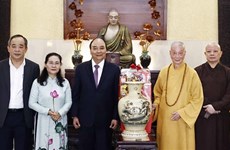 越南国家主席阮春福春节前走访慰问越南佛教协会法主