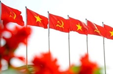 越南共产党建党93周年：越老友谊之路充满越南共产党的印记