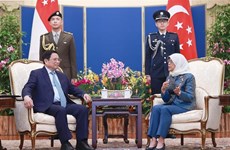 越南政府总理范明政会见新加坡总统哈莉玛·雅各布