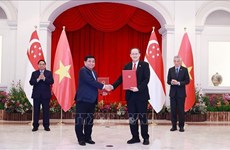 范明政总理访问新加坡和文莱：为加强越南与两国关系注入新动力