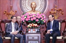 胡志明市领导会见老挝国会司法委员会主任
