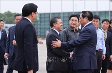 越南政府总理范明政启程前往老挝出席第四届湄公河委员会峰会
