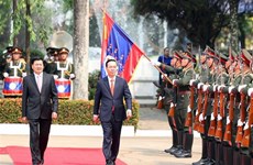 老挝媒体深度报道越南国家主席武文赏访老之行取得的丰硕成果