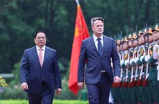 越南政府总理范明政举行仪式 欢迎卢森堡大公国首相格扎维埃·贝泰尔访越