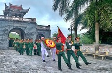 奠边省为在老挝牺牲越南志愿军烈士遗骸举行安葬仪式