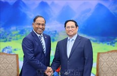 越南政府总理范明政会见马来西亚外交部长