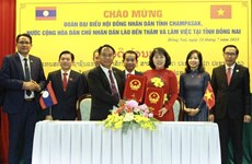 同奈省和老挝占巴塞省就人民议会工作交换经验