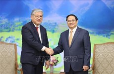 越南政府总理范明政会见菲律宾外交部长恩里克·马纳洛