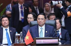 越南政府总理范明政出席东盟-印度领导人会议和东亚峰会
