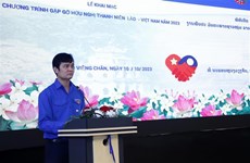 越南和老挝青年携手保护和推动国家发展