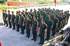 金瓯省边防部队举行高速巡逻舰升旗仪式