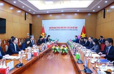 越共中央对外部部长黎怀忠会见中国外交部长王毅