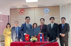 越南与老挝签署文书档案领域的合作谅解备忘录