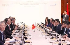越南政府总理范明政就绿色转型与日本企业进行座谈