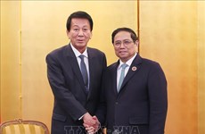 越南政府总理范明政会见原越日关系特别大使和日本国际合作银行执行董事