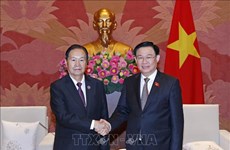国会主席王廷惠会见老挝国会副主席夏伦·亚保和